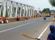 Fenomena Penyapu Koin di Jembatan Sewo: Tradisi, Keberuntungan, atau Kreativitas?